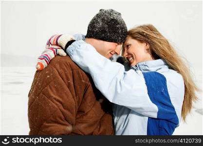 Couple Hugging in Snow