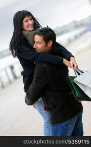 Couple hugging in the street