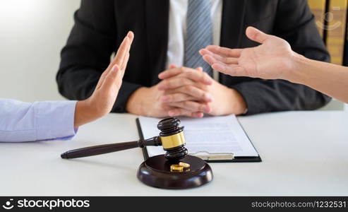 Couple husband and wife during divorce process listening to lawyer dissolves marriage contract, Dissolution of marriage concept