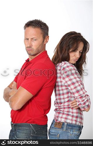 Couple in a bad mood on white background