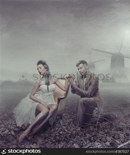 Couple in a decaying landscape.