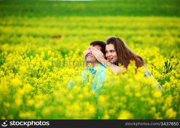 Couple in a field of flowers