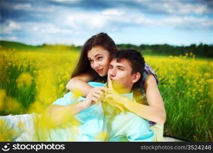 Couple in a field of flowers
