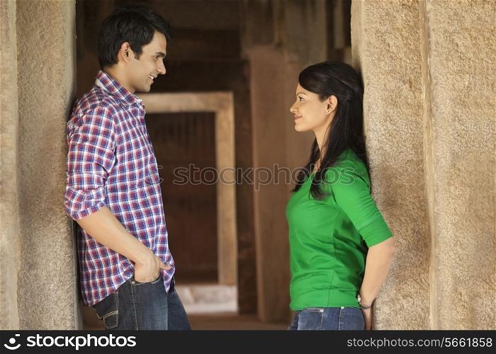 Couple in a fort looking at each other