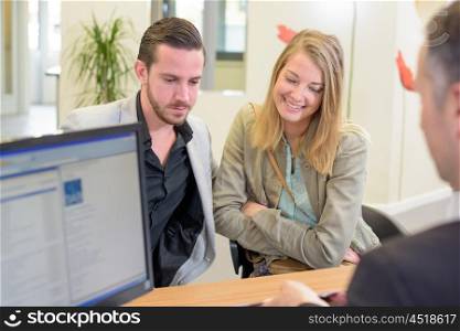 Couple in a meeting in an office