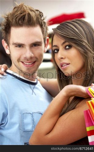 couple in a retail store shopping clothes