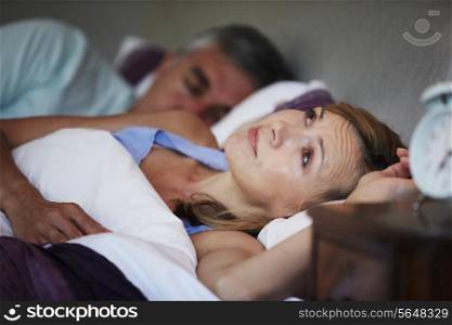 Couple In Bed With Wife Suffering From Insomnia