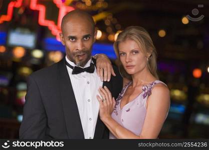 Couple in casino with cigar (selective focus)