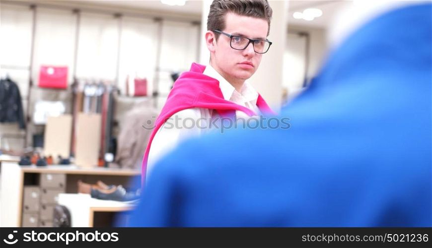 couple in Clothing Store looking for new sweater