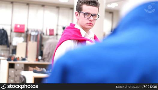 couple in Clothing Store looking for new sweater