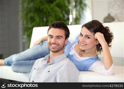 Couple in front of television