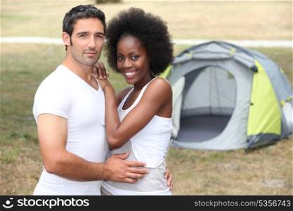 Couple in front of tent