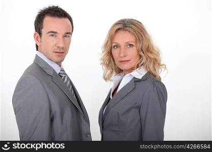 Couple in gray suit on white background