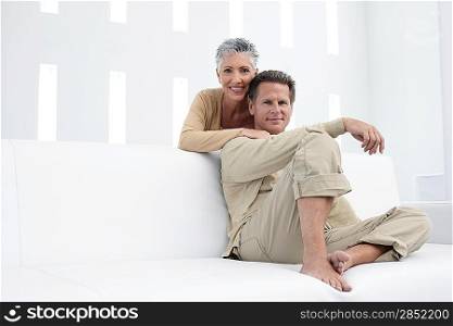 Couple in living room portrait