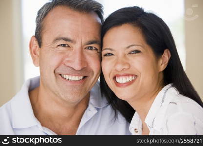 Couple in living room smiling