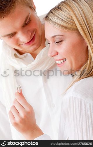 Couple in love - getting engagement ring, romantic