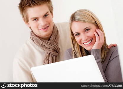 Couple in love - happy relax at home together in living room