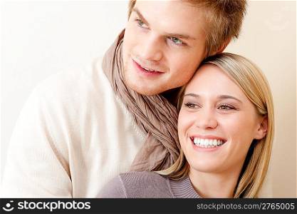 Couple in love - happy relax at home together in living room