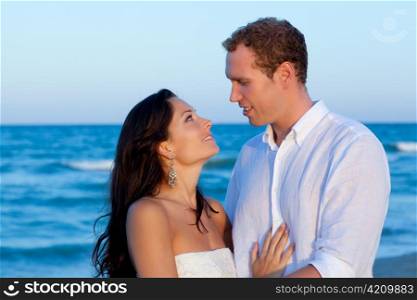 couple in love hug in blue sea vacation in Spain