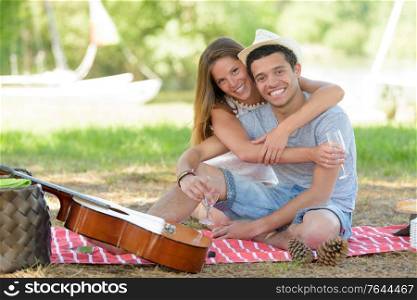 couple in love hugging on a picnic