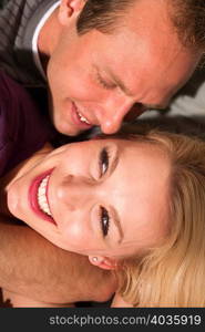 Couple in playful embrace