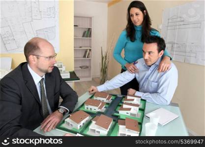 Couple in real estate agency