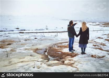Couple in the winter landscape