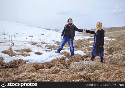 Couple in the winter landscape