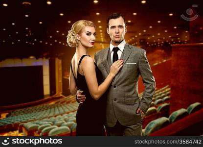Couple in theatre interior