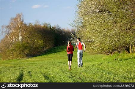 Couple jogging at a spring afternoon