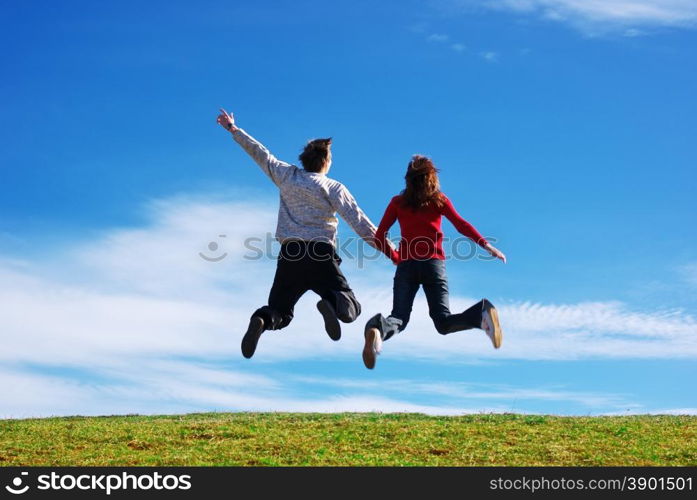 Couple jump in the meadow. Conceptual design.