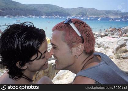 Couple Kissing on Beach