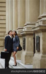 Couple Kissing Outside Building