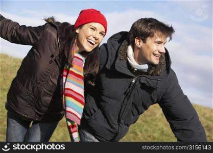 Couple Laughing In The Park Together