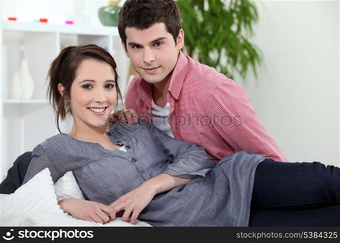 Couple laying on couch