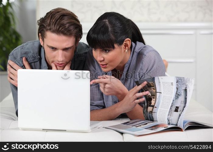 Couple looking at a brochure