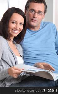 Couple looking at brochure