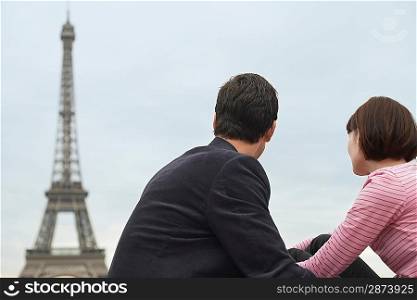 Couple Looking at Eiffel Tower