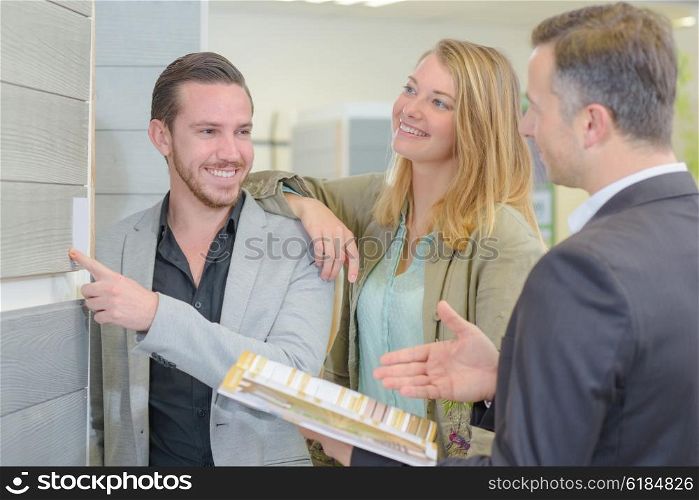 couple looking at interior design samples