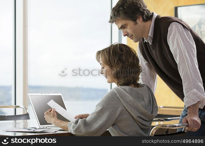 couple looking at paperwork