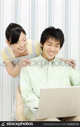 Couple looking at PC