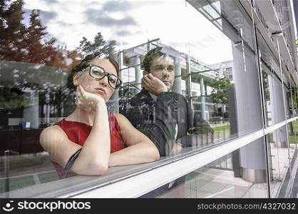Couple looking out window