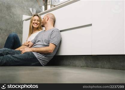 couple love floor kitchen