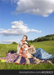 couple lying in field
