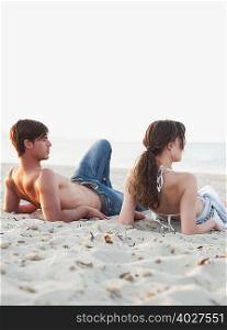 couple lying on the beach