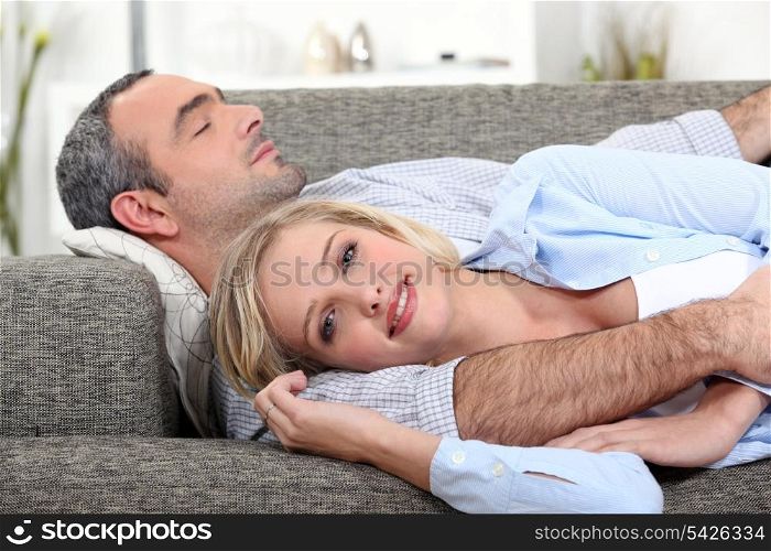 Couple lying on the couch