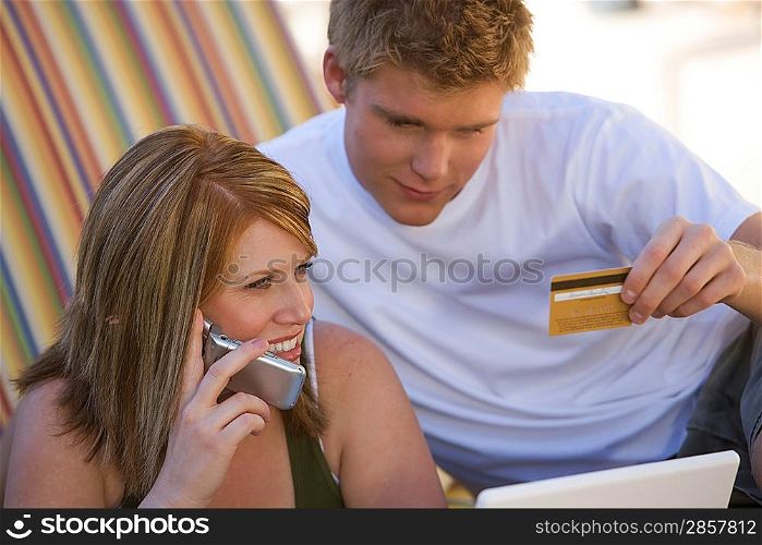 Couple Making Credit Card Purchase