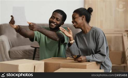 couple making plan together redecorate house