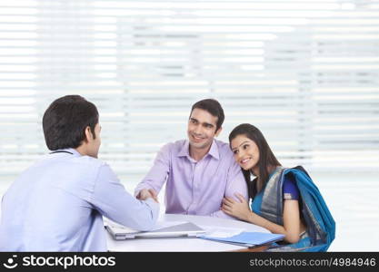 Couple meeting with financial advisor