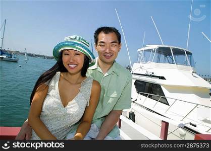 Couple Near Yacht in Marina
